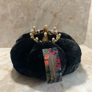 Christian lacroix Madison: black fur plush pumpkin, with a gold pearl crown.